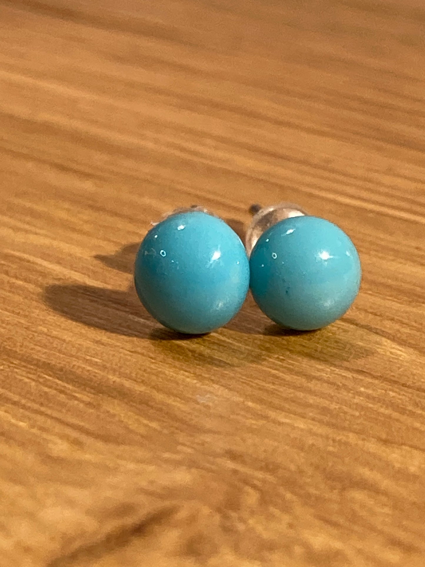 Puces bleu ciel  en verre de petite taille