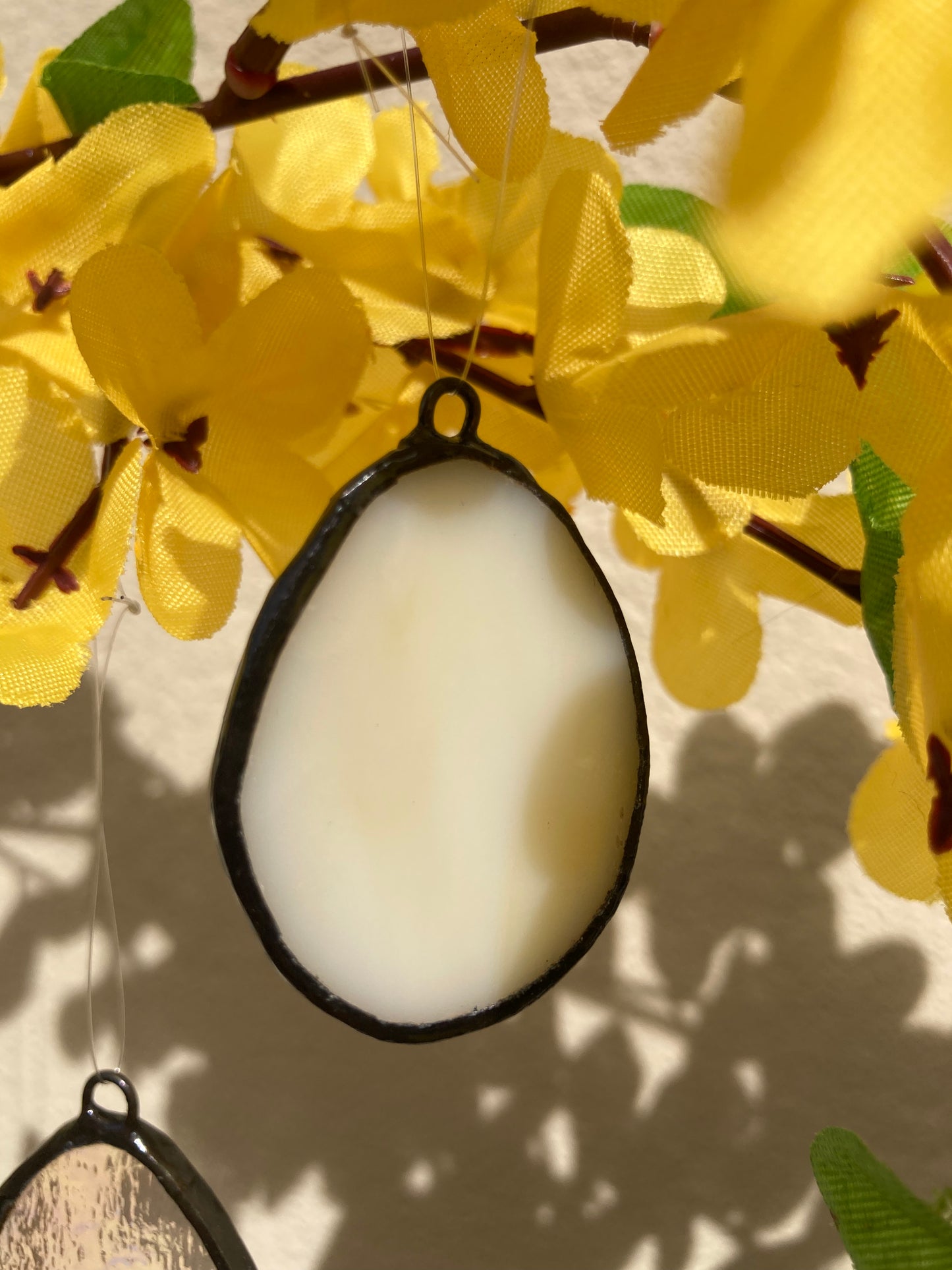 Œuf en verre blanc à suspendre