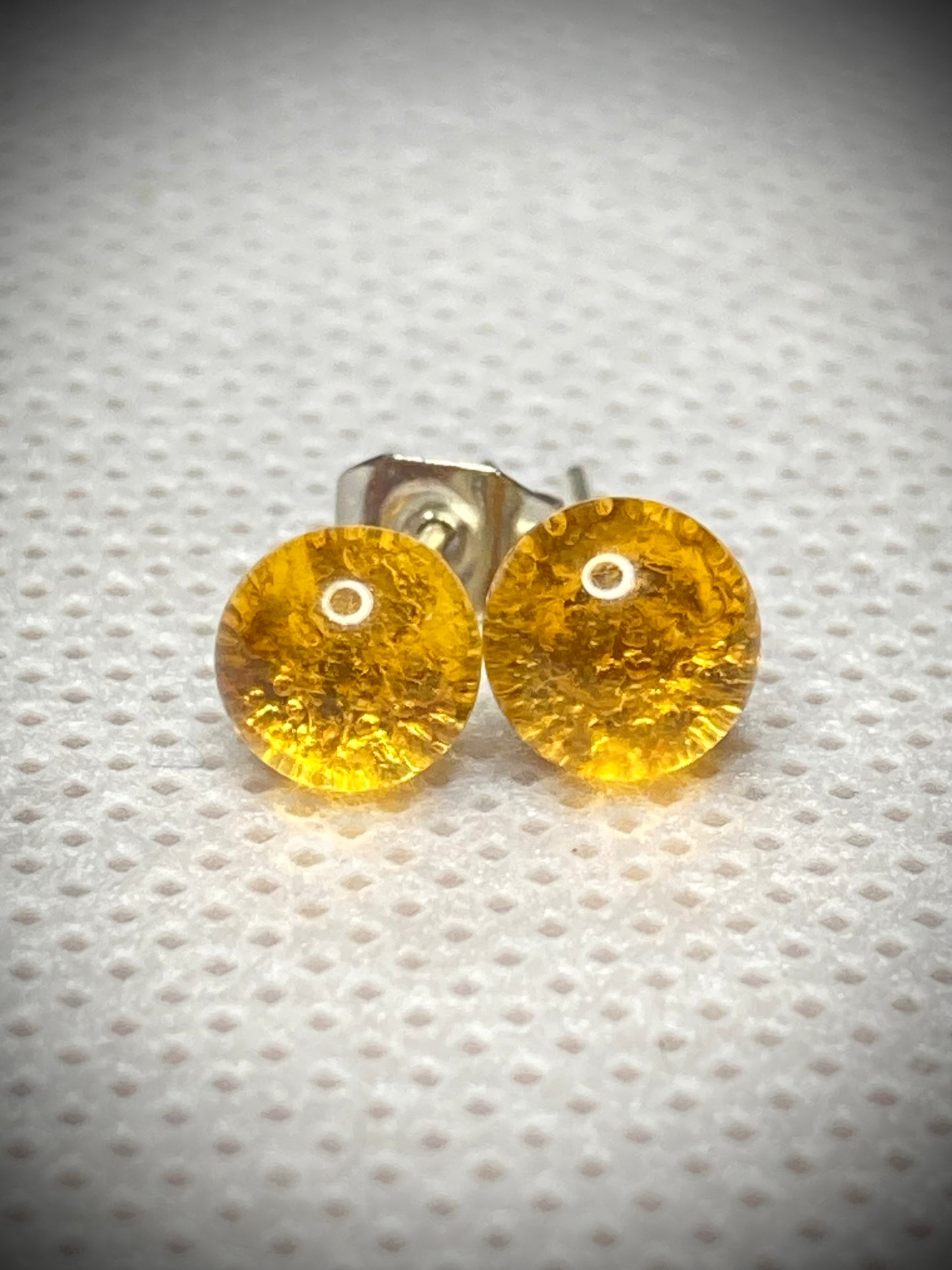 Puce de couleur ambre en verre