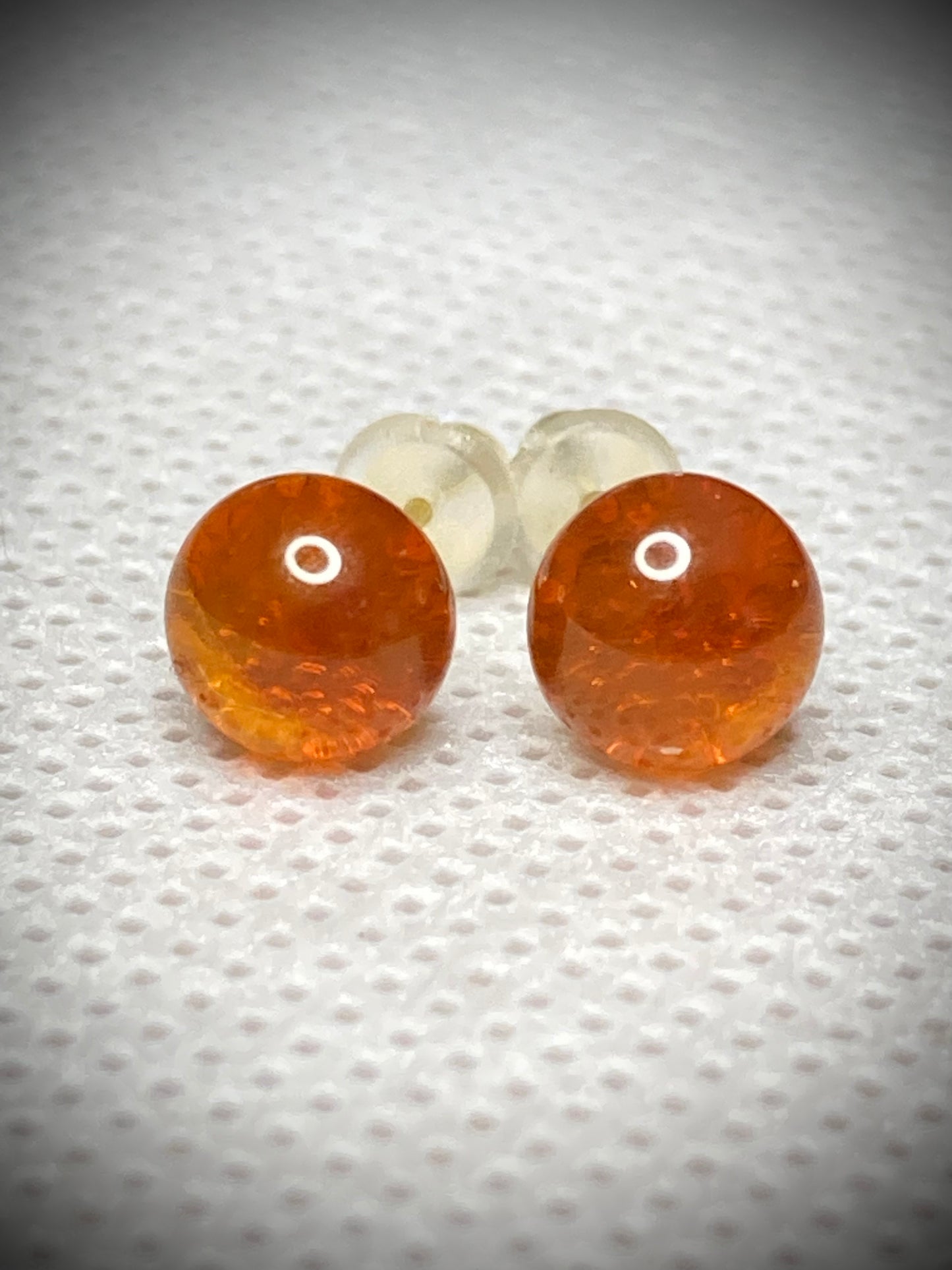 Puce de couleur ambre foncé en verre